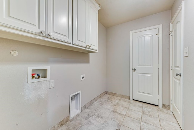 laundry room featuring hookup for a washing machine, hookup for an electric dryer, and cabinets