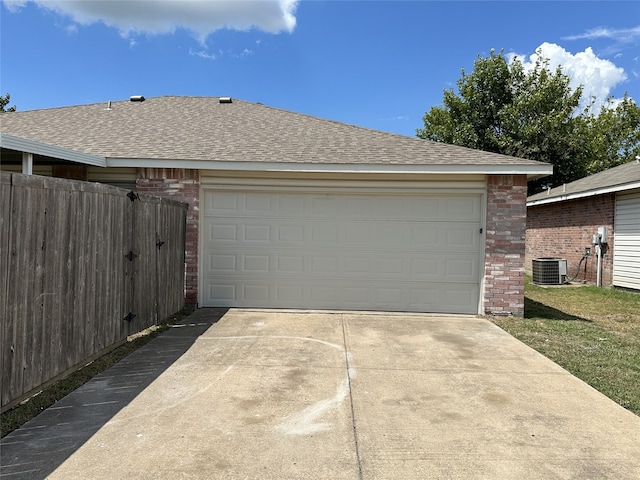 garage featuring central air condition unit