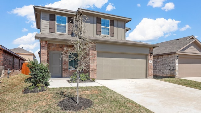 front of property featuring a garage and a front lawn