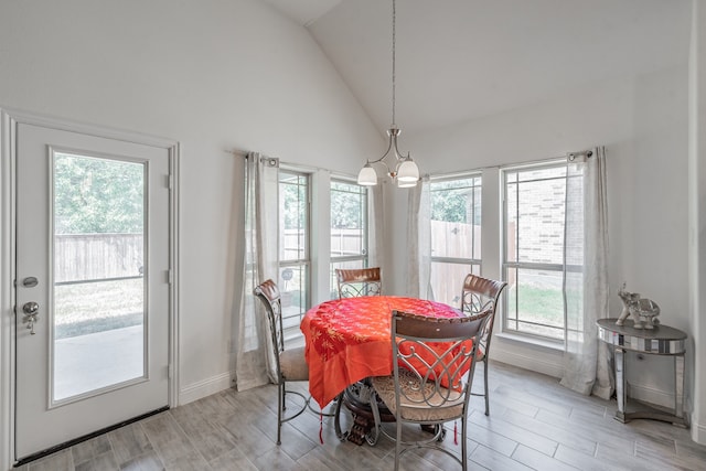 dining area featuring light wood-type flooring and a wealth of natural light