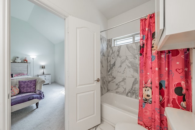 bathroom featuring toilet, shower / bathtub combination with curtain, and vaulted ceiling