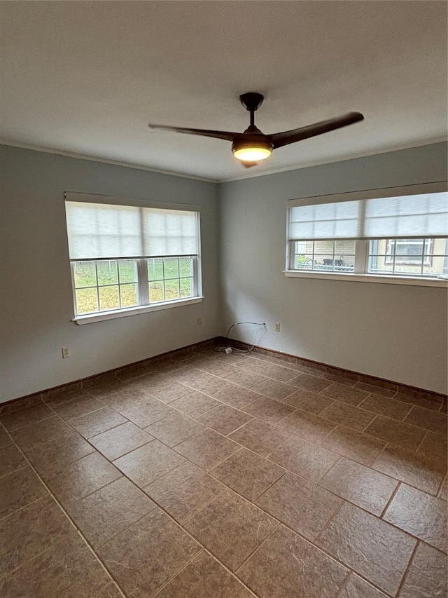 spare room featuring ceiling fan