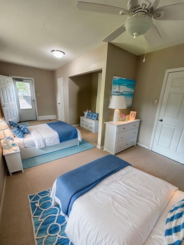 bedroom with light carpet and ceiling fan