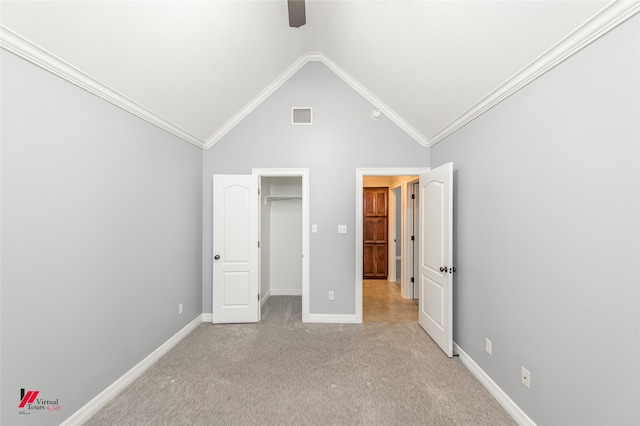 unfurnished bedroom featuring ornamental molding, light colored carpet, high vaulted ceiling, and ceiling fan