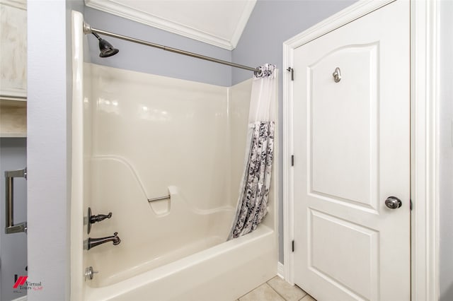 bathroom featuring ornamental molding, tile patterned floors, and shower / bath combo with shower curtain