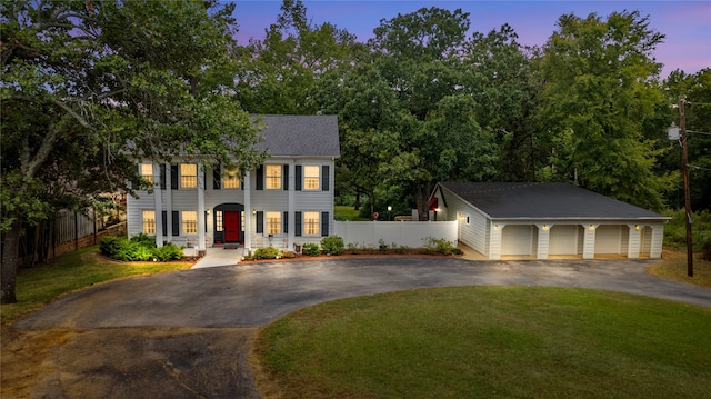 view of front of home with a yard