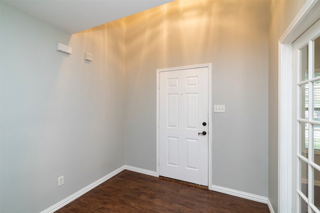 foyer entrance featuring dark hardwood / wood-style flooring