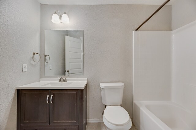 full bathroom featuring vanity, toilet, and washtub / shower combination