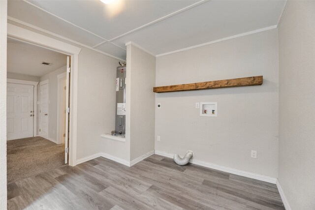 washroom featuring electric water heater, wood-type flooring, washer hookup, and hookup for an electric dryer