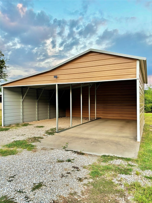 garage featuring a carport