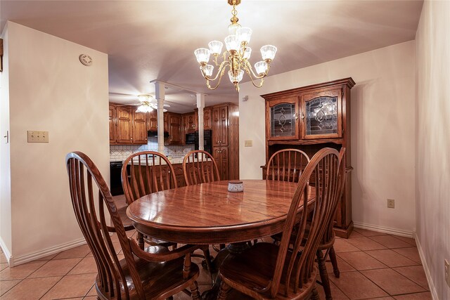 tiled dining space featuring ceiling fan and decorative columns