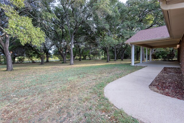 view of yard with a carport