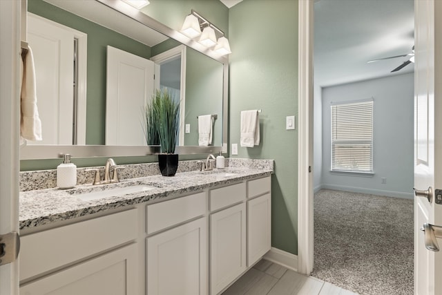 bathroom with vanity and ceiling fan