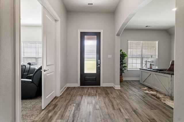 entrance foyer featuring hardwood / wood-style flooring