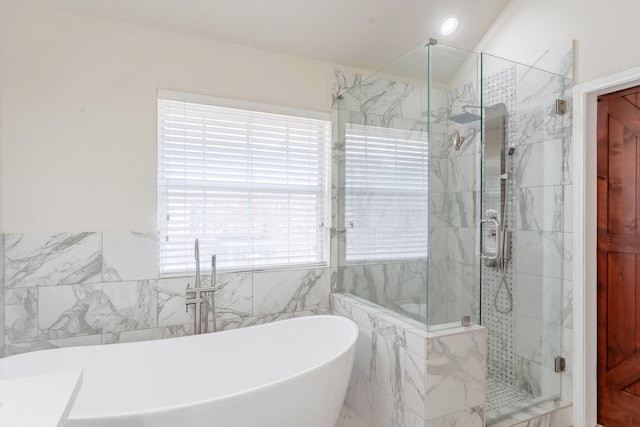 7525 Juliet Ln, Fort Worth, TX 76137 - bathroom featuring a stall shower, tile walls, and a freestanding tub