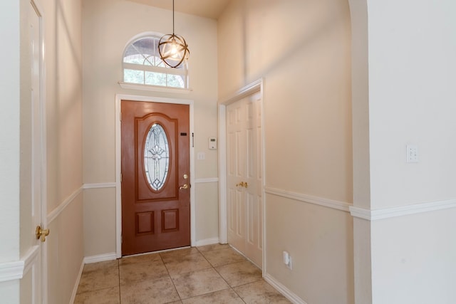 entryway featuring light tile patterned flooring