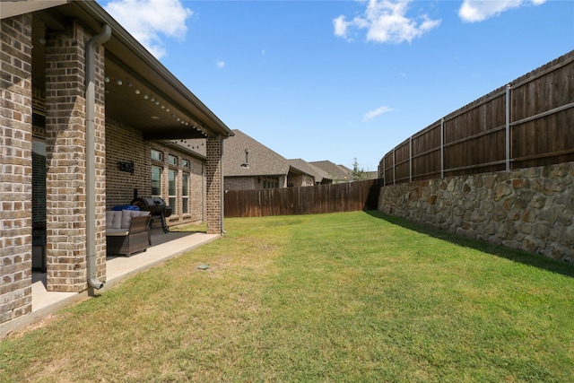 view of yard with a patio area