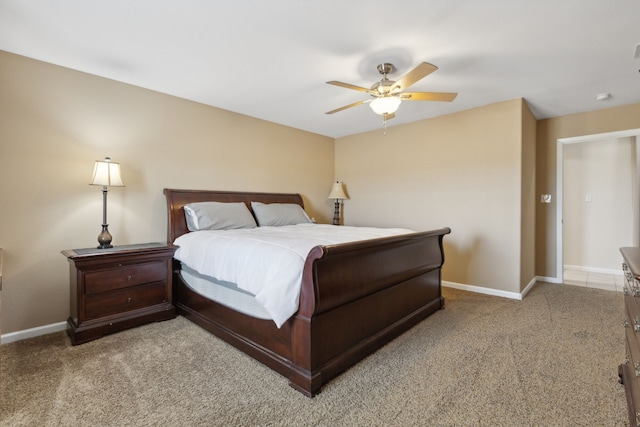 bedroom with light colored carpet and ceiling fan