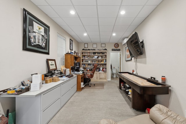 home office featuring light colored carpet and a drop ceiling