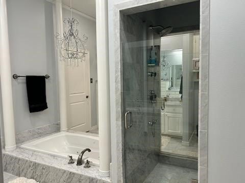 bathroom featuring plus walk in shower