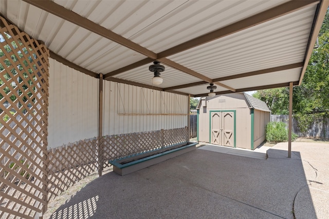 view of patio / terrace with a storage shed