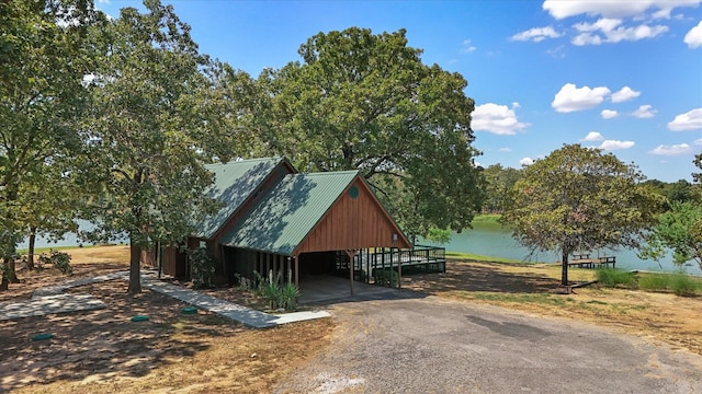 view of stable featuring a water view