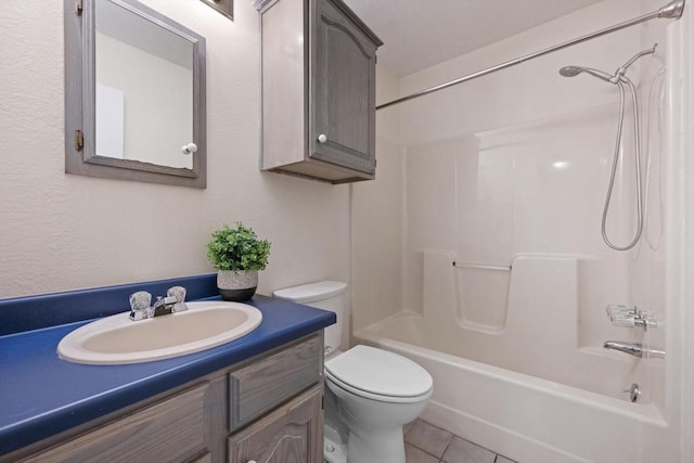 full bathroom featuring toilet, vanity, bathtub / shower combination, and tile patterned flooring