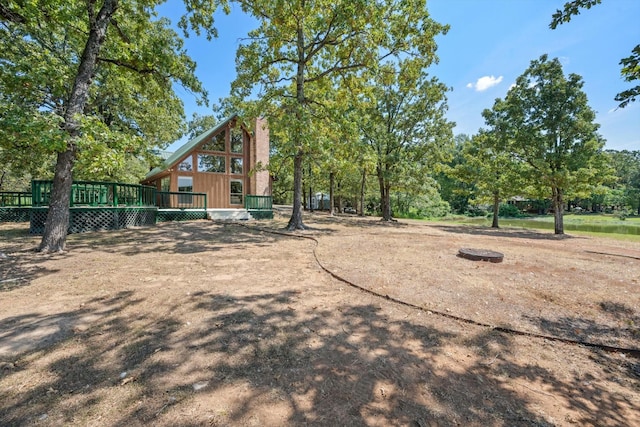 view of yard featuring a deck