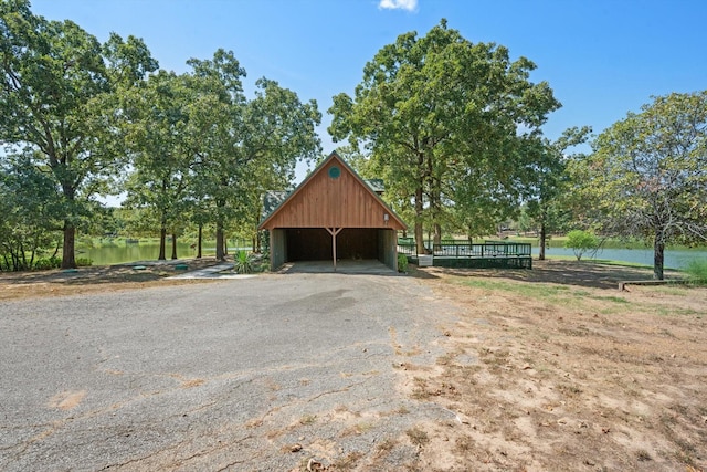 view of outbuilding featuring a water view