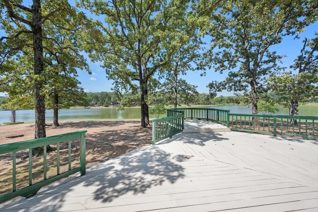 deck featuring a water view