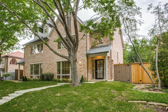 view of front of home with a front yard