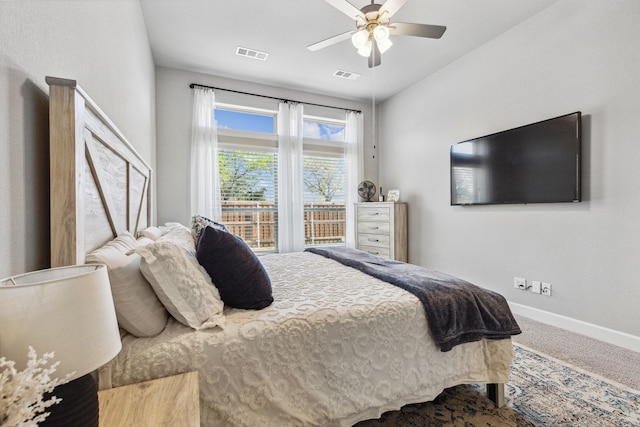 carpeted bedroom featuring ceiling fan