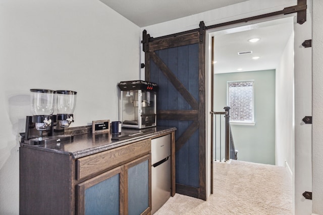 bar with a barn door and carpet