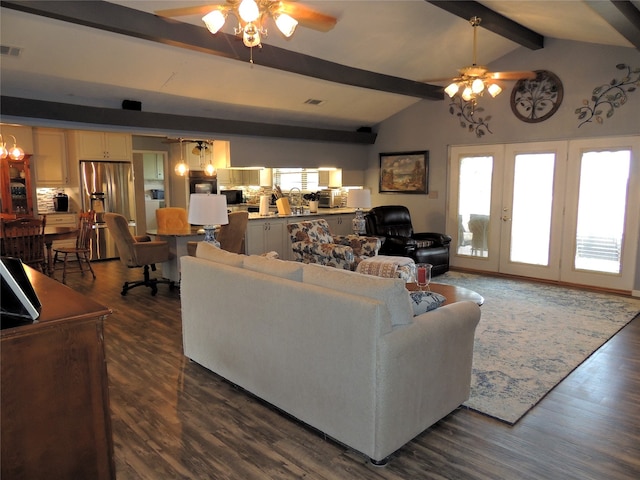 living room featuring ceiling fan, dark hardwood / wood-style flooring, and vaulted ceiling with beams