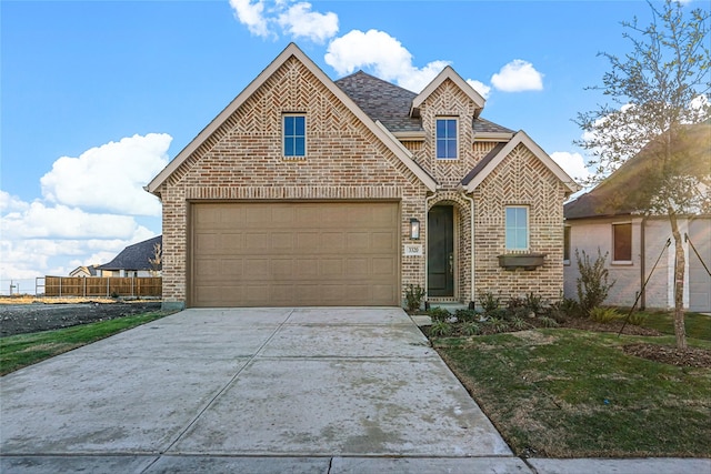 view of front of property featuring a garage