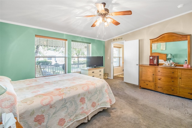 bedroom featuring light carpet, multiple windows, and ceiling fan