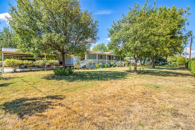 view of yard featuring a porch