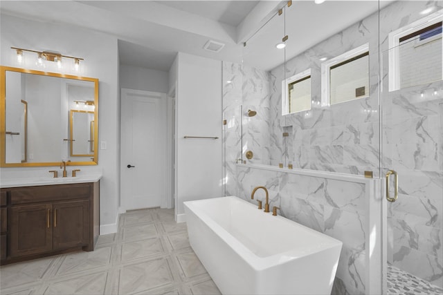 bathroom with separate shower and tub and vanity