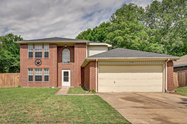 view of front facade with a garage and a front lawn