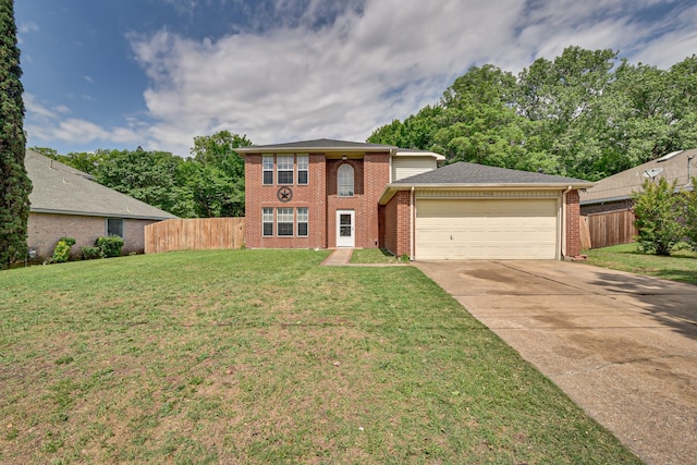 view of front facade with a garage and a front yard