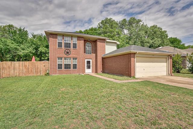 view of front of home with a garage and a front yard