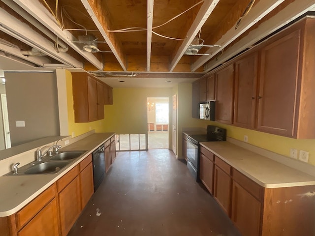 kitchen with black dishwasher, electric range oven, and sink