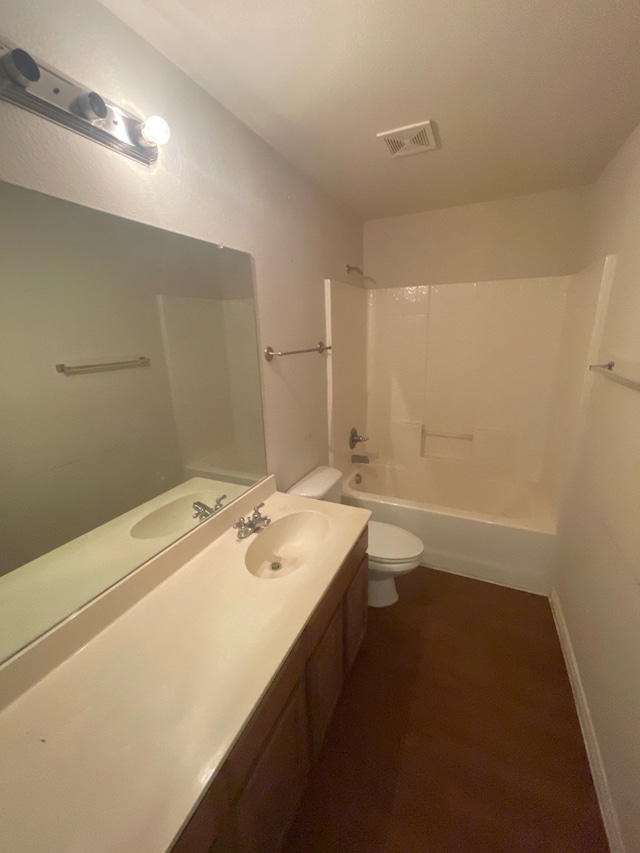 full bathroom featuring shower / bathtub combination, toilet, and vanity