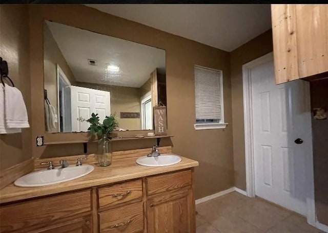 bathroom featuring vanity and tile patterned floors