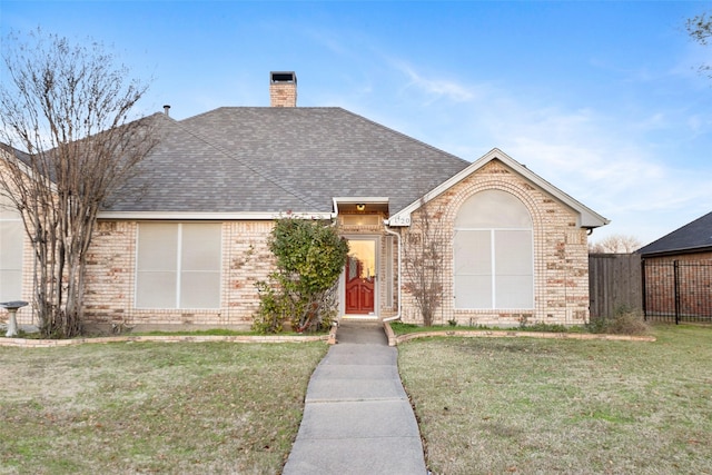 view of front of home with a front lawn