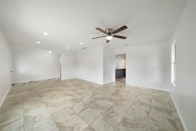 unfurnished room featuring ceiling fan