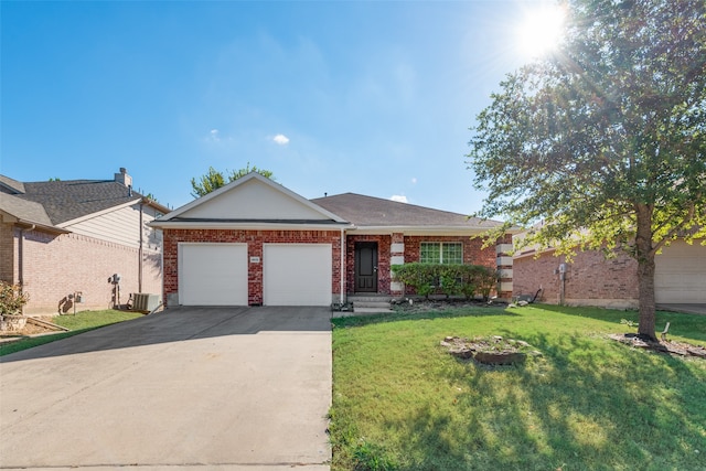 ranch-style house with a garage and a front lawn