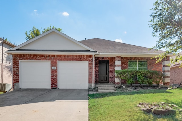 ranch-style home with a garage and a front lawn