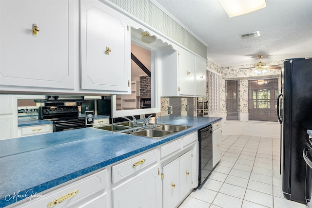 kitchen featuring light tile patterned floors, sink, black appliances, ceiling fan, and a textured ceiling