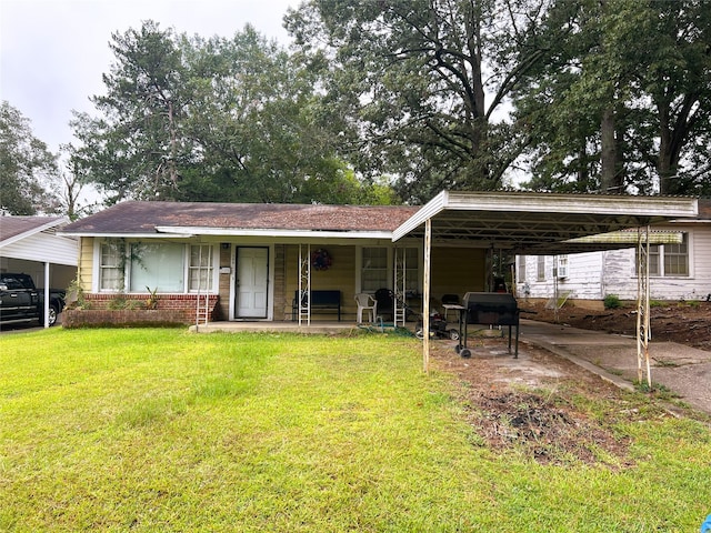 ranch-style house with a front lawn and brick siding